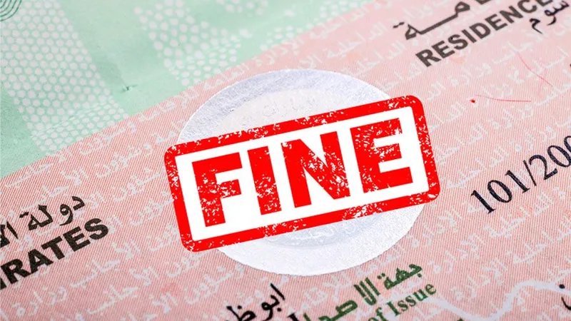 Fine_stamp_with_residence_visa_in_the_background_499f28162c