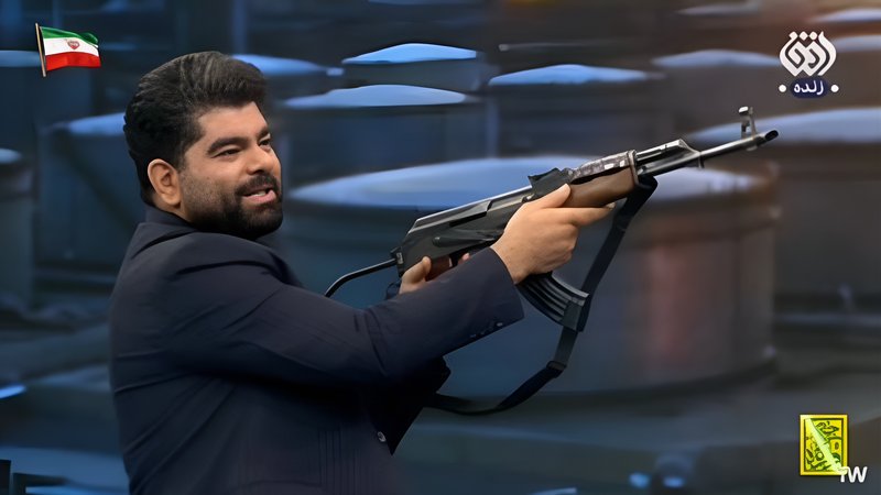 شلیک با اسلحه در برنامه زنده تلویزیون به سمت پرچم امارات!